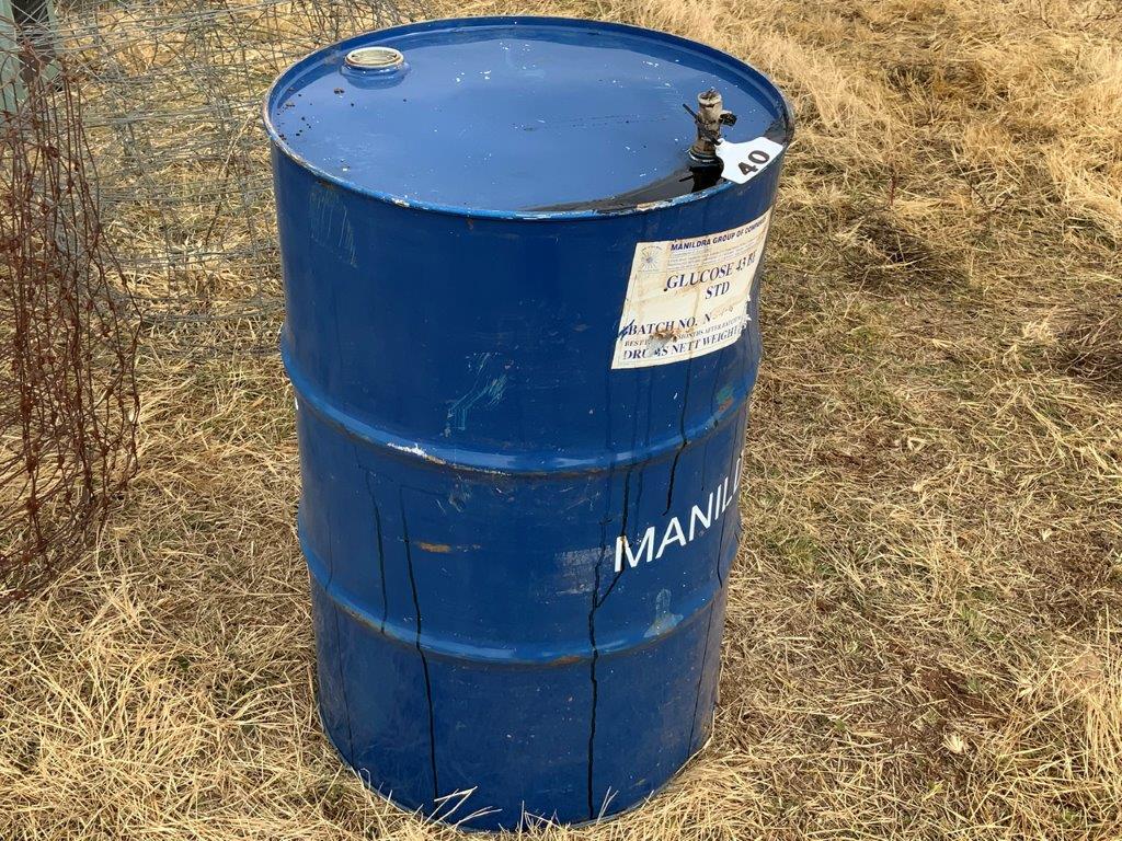 Lot 40 Molasses drum AuctionsPlus