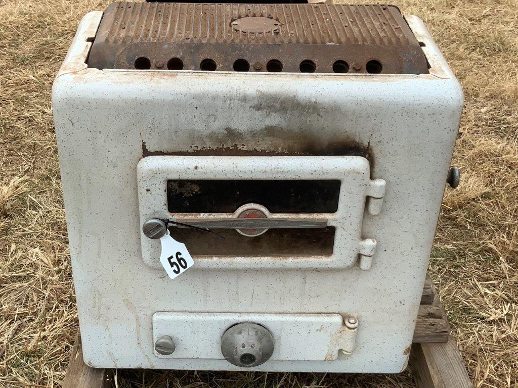 Lot 56 - Warm bright wood heater | AuctionsPlus