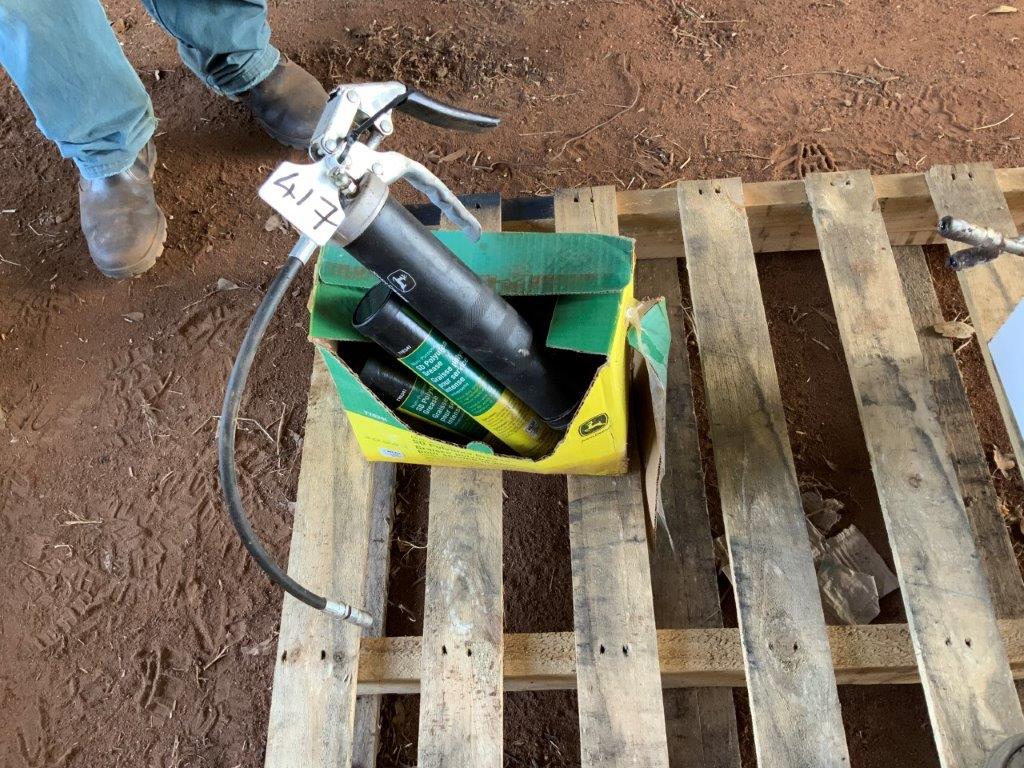 Lot 417 John Deere grease gun and cartridges AuctionsPlus
