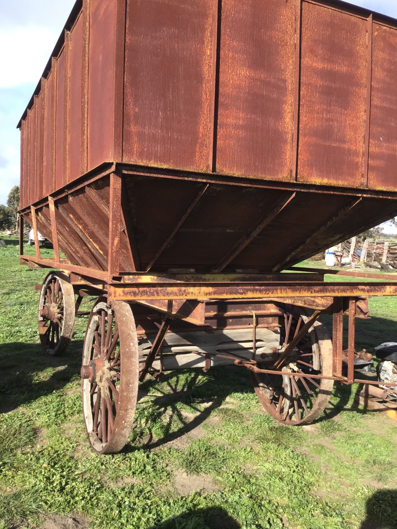 Lot 14 Vintage seed bin on old wheel wagon AuctionsPlus
