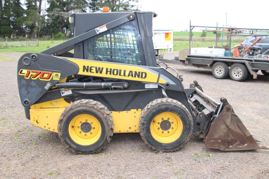 Lot 22 - New Holland L170 Bobcat with Backhoe | AuctionsPlus