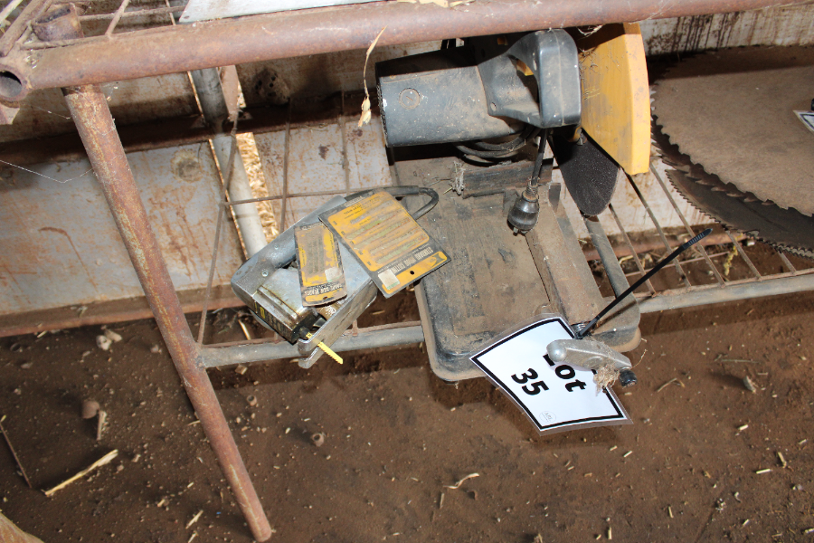 Lot 35 - Metal drop saw and jigsaw. | AuctionsPlus