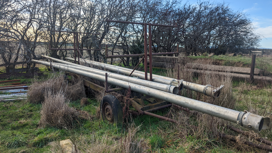 Lot 138 Irrigation Pipe Trailer w/ 5x5' Pipes AuctionsPlus