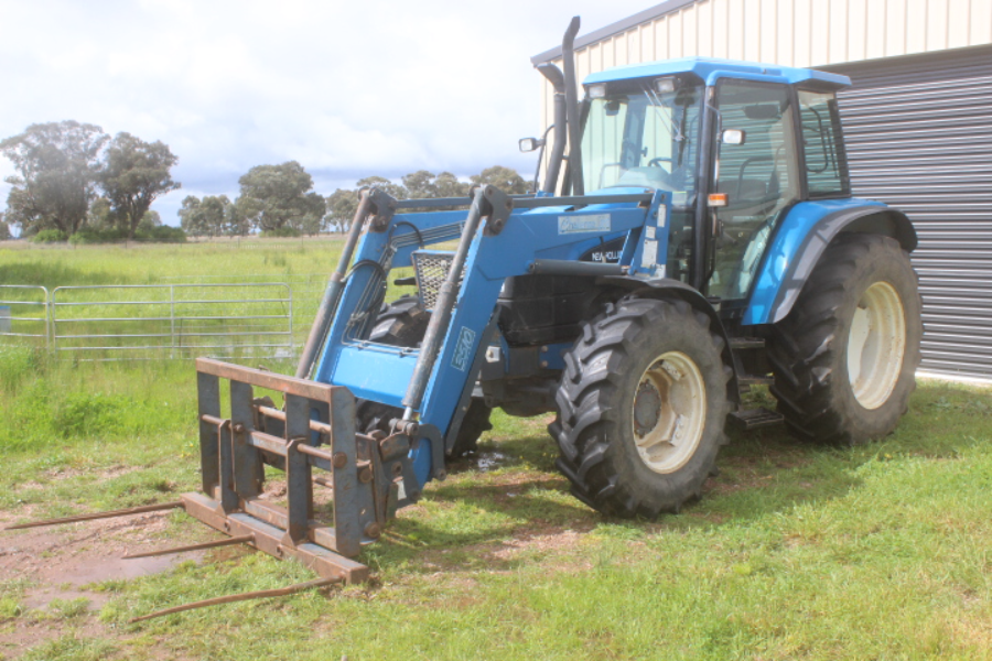 Lot 21 New Holland TS110, With Challenge Front End Loader AuctionsPlus