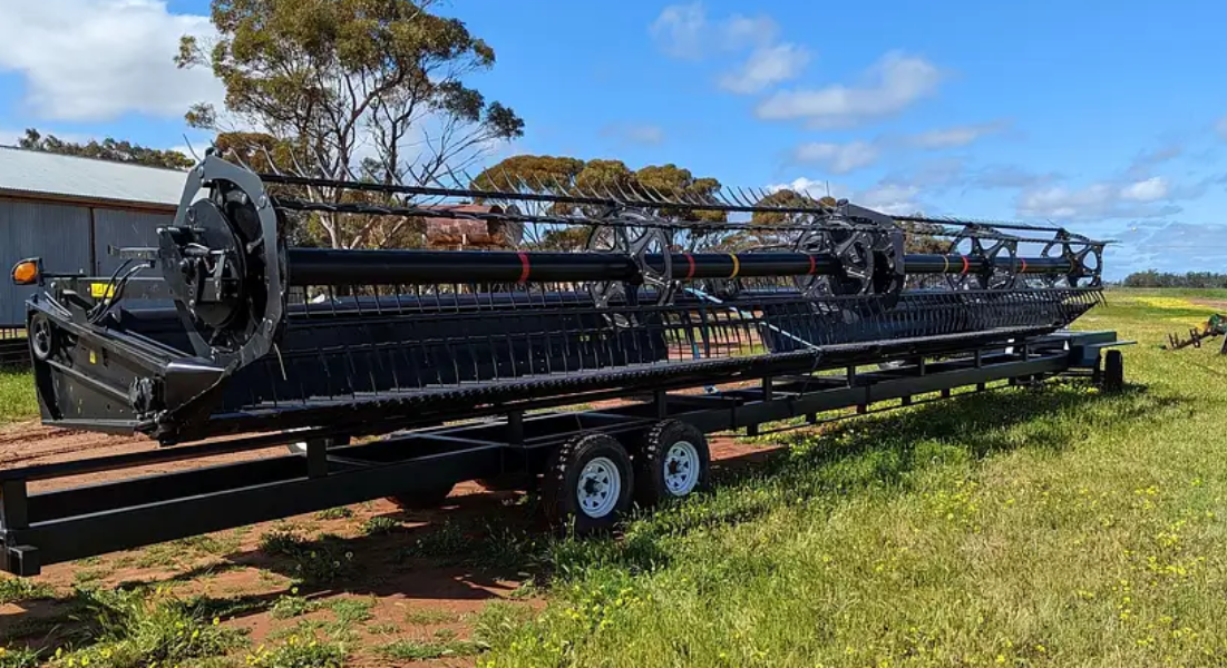 Lot 1 - Macdon Header Front with Adapter and brand new 45 foot Comb ...