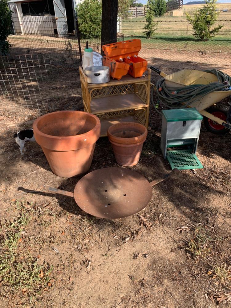 Lot 154 Wheel barrow and fire screen, lamb and calf feeder, chook