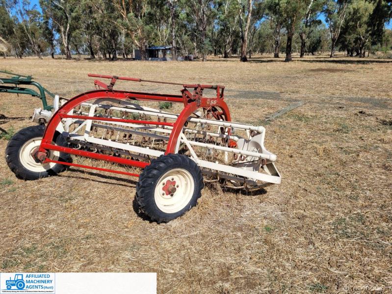 Lot 127 - NH-56 8ft Rollor-bar Hay Rake ~ Ground drive | AuctionsPlus