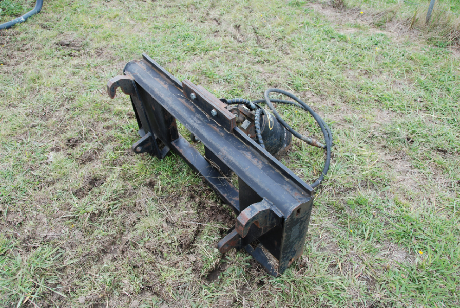 Lot 12 Digga FEL mounted post hole digger AuctionsPlus