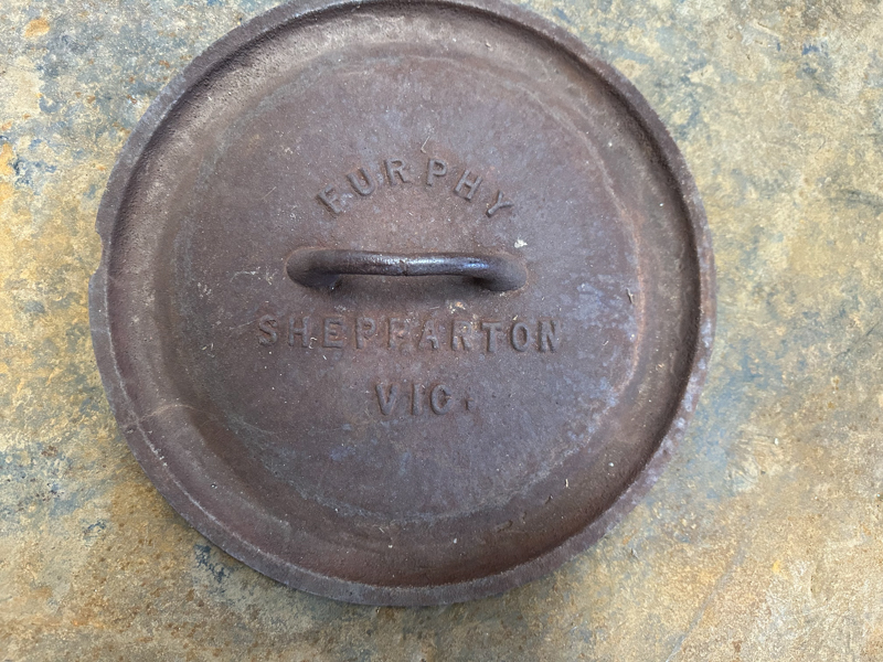 Lot 67 Furphy Camp oven. The bottom has been cut out. Furhy Cast iron