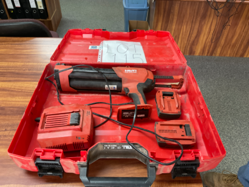 Lot 115 Caulk Gun Battery & Charger AuctionsPlus
