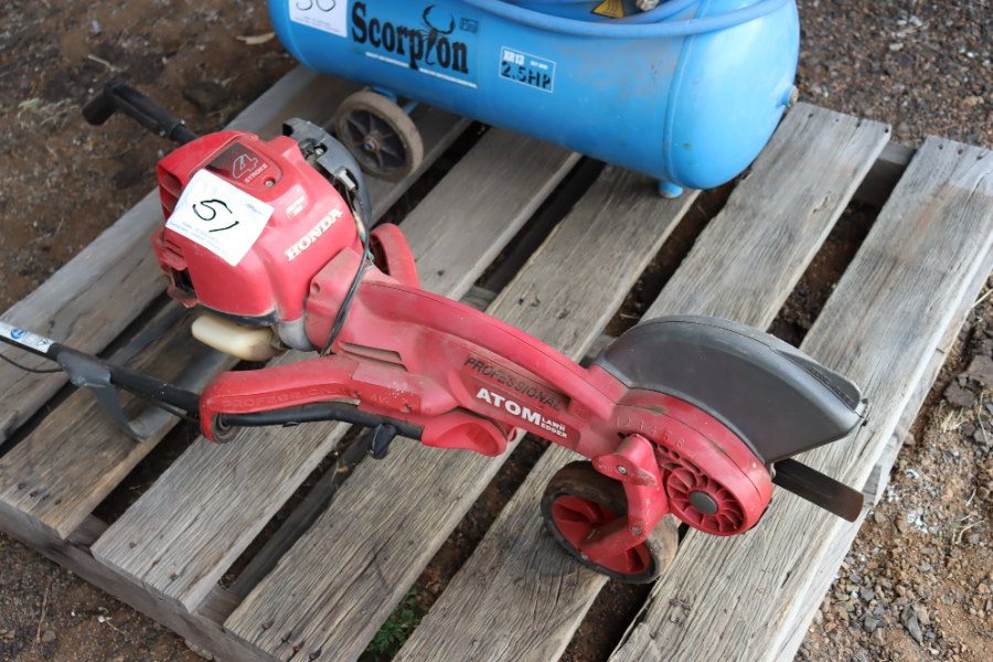 Lot 51 Atom lawn edger AuctionsPlus