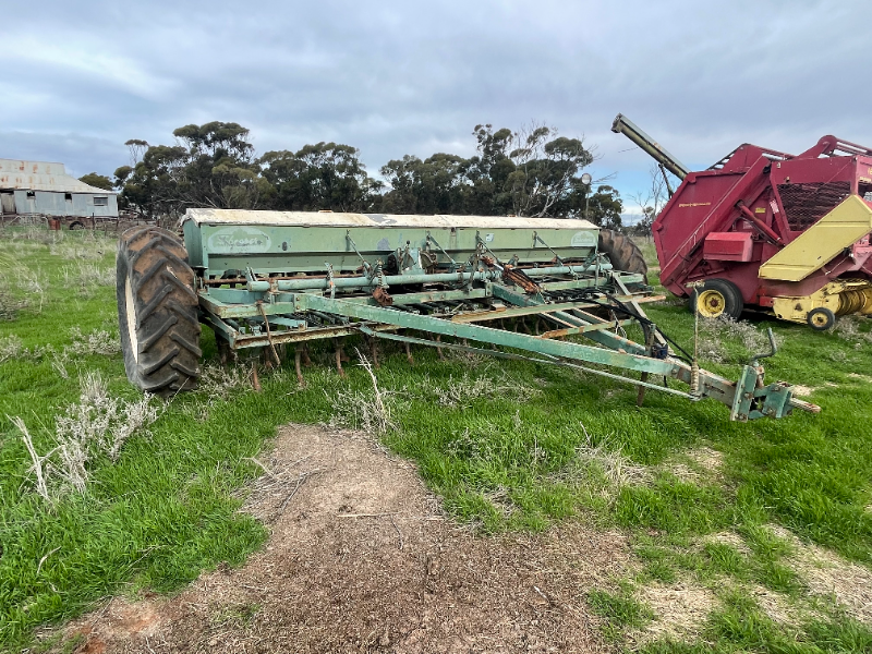 Lot 30 - John Shearer Combine, 28 row, Spring Release, w Harrows ...