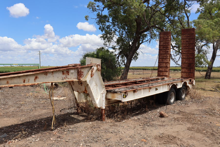 Dual axle low loader and ramps | AuctionsPlus