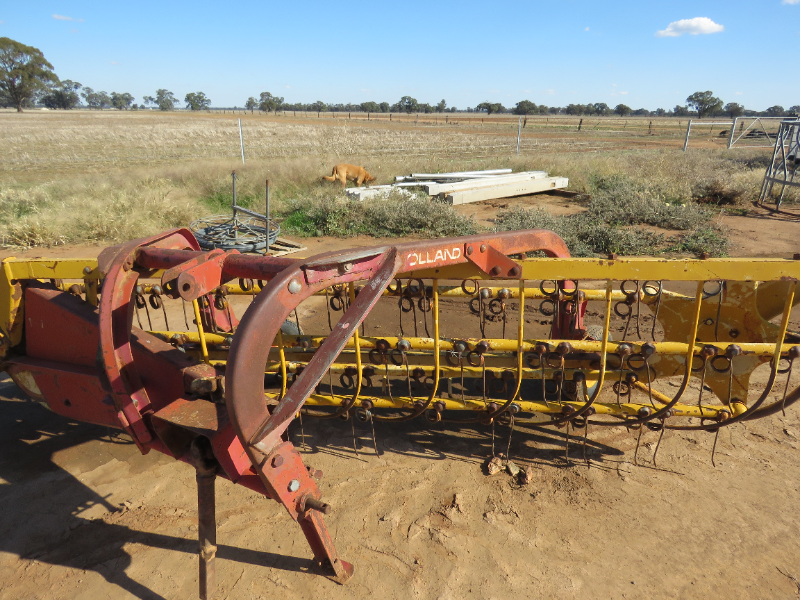 LOT 55 - HAY RAKE - NEW HOLLAND - PTO - ROLLER BAR | AuctionsPlus
