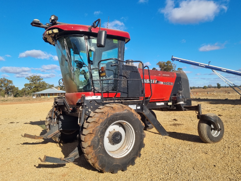 LOT 28 - Case IH WD2303 + 36ft Front | AuctionsPlus