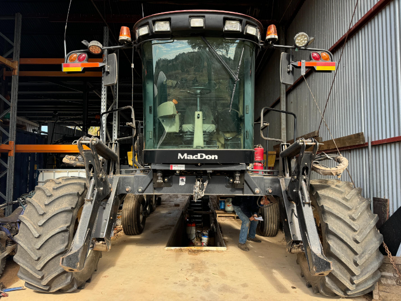 Lot 12 - 2012 Macdon M155 Self Propelled Windrower | AuctionsPlus
