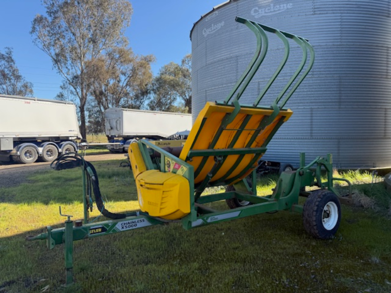 Lot 3 - HUSTLER TRAILING HAY FEEDOUT CART | AuctionsPlus