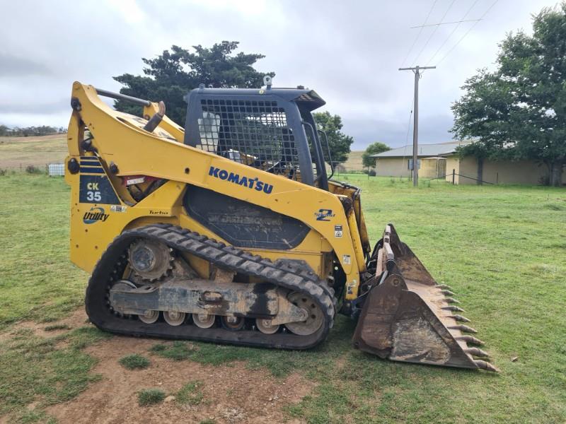 Lot 10 komatsu ck35 Skid Steer Loader AuctionsPlus