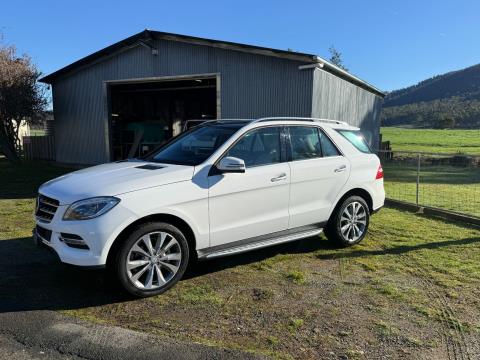 001 · 2014 Mercedes Benz ML350 (Used)
