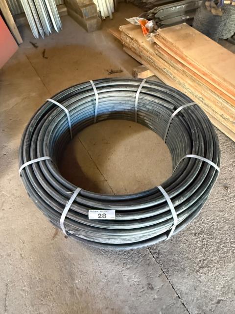 028 · Coil of 1'' Poly Pipe (Used)