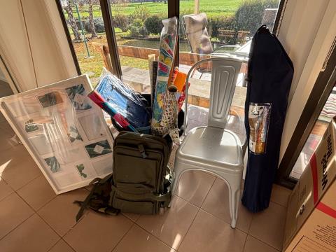 100 · Knapsacks, Picture Frame, Camp Chair (Used)