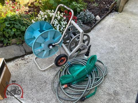230 · Assorted Garden Hoses & Reels