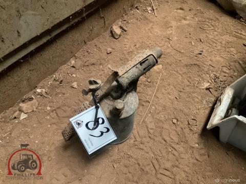 083 · Coleman Monitor, Blow Torch (Used)