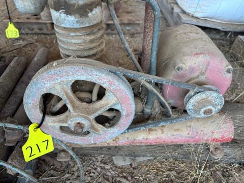 Lot 217 · Vintage air compressor & weights