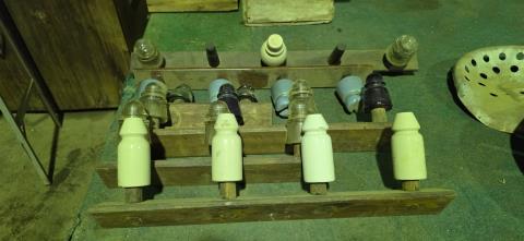 029 · Collection of Insulators Mounted to Gal Box