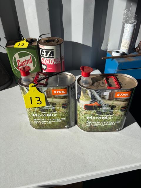 Lot 13 · 2 x Stihl empty tins
