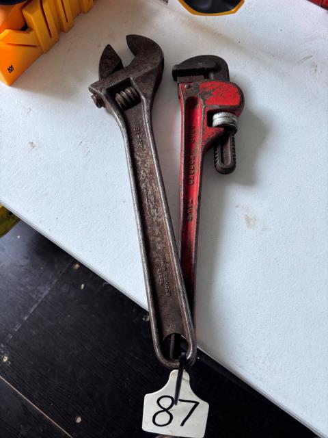Lot 87 · Large spanner + Pipe wrench